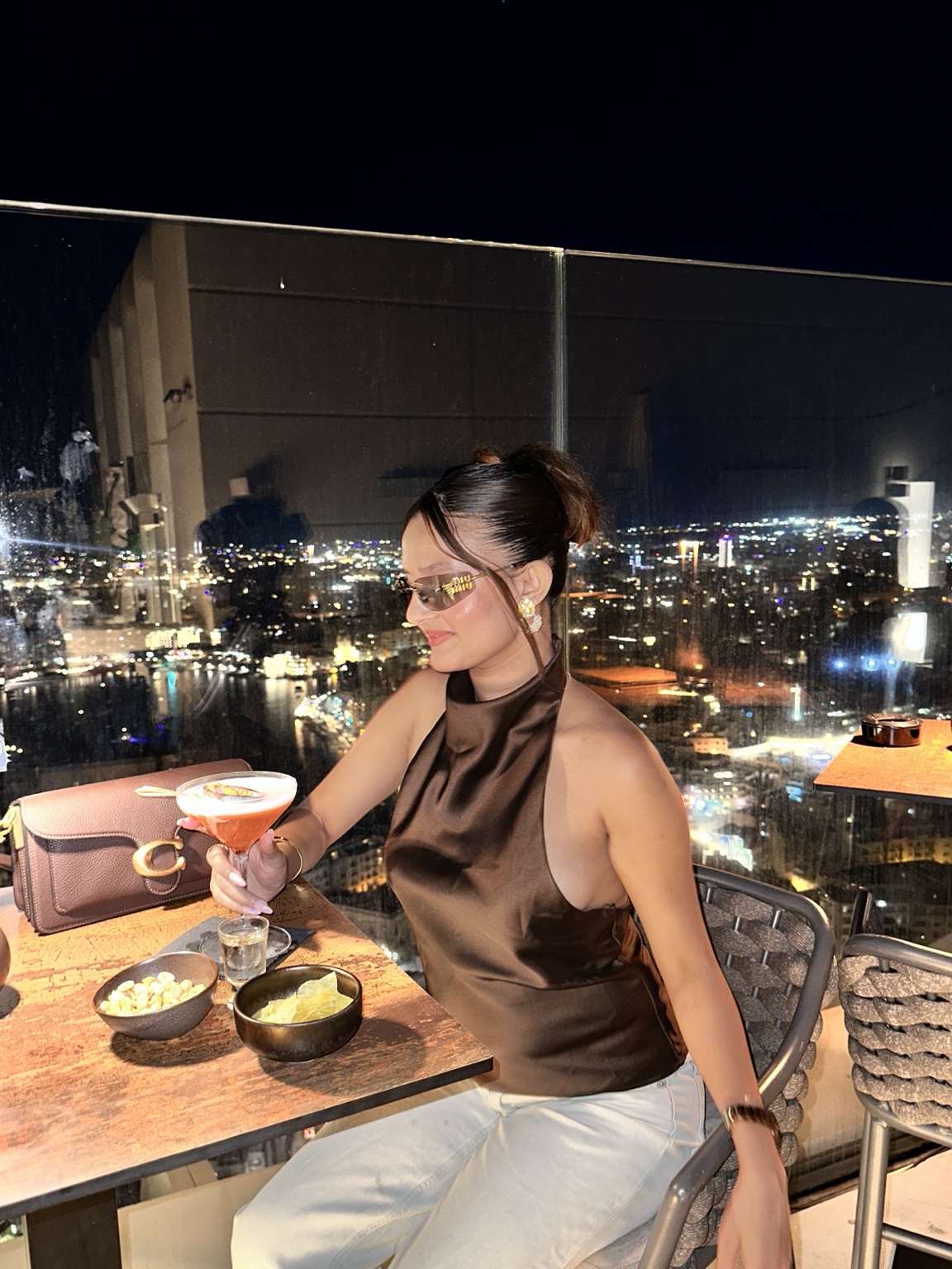 Yogeswari enjoying a city evening